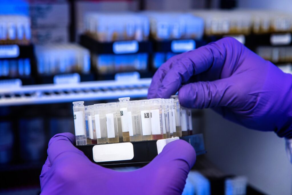 Forensic Toxicology Expert Witness Lyle Hayes holding test tubes